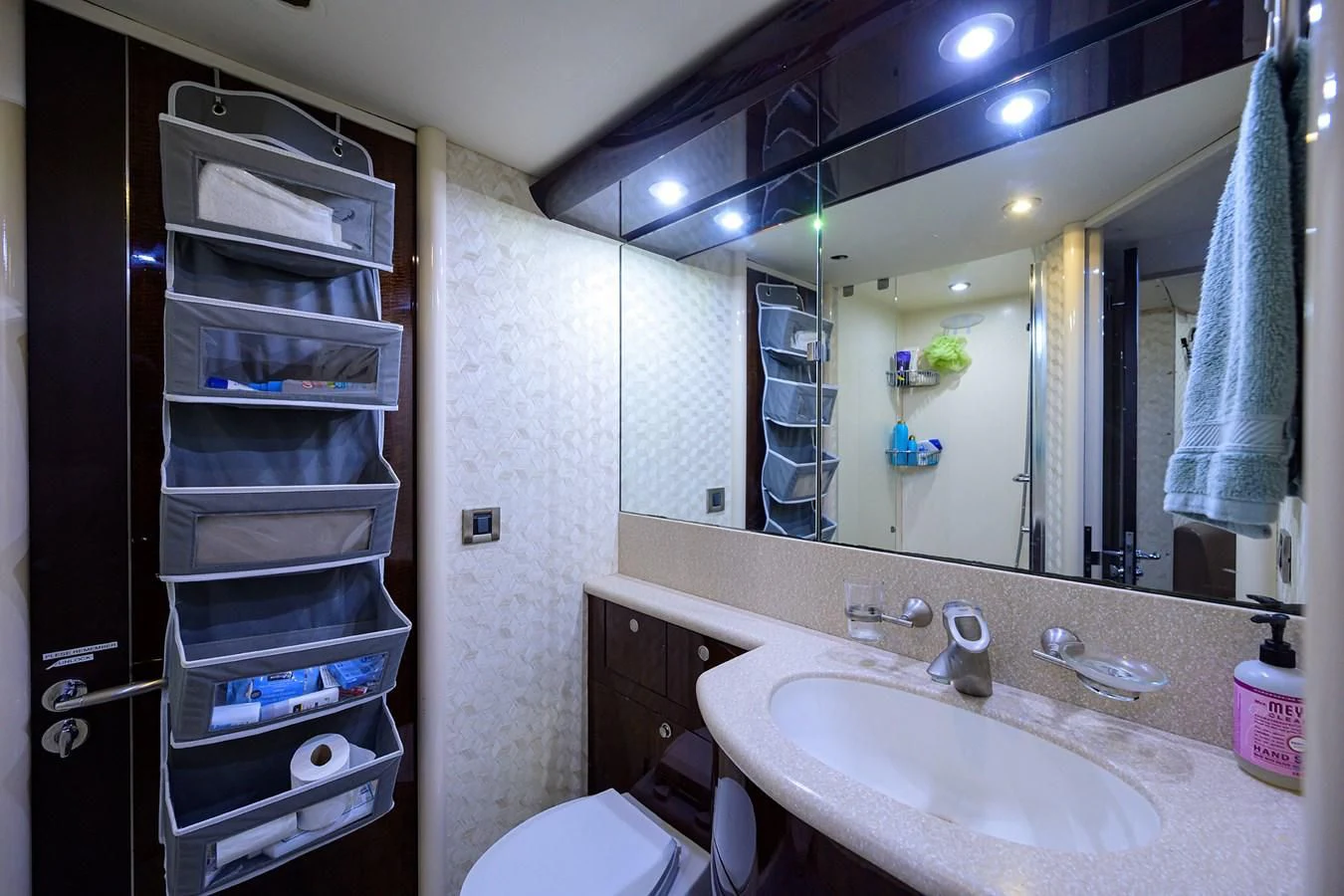 a bathroom with a large mirror aboard THE JOB FATHER Yacht for Sale