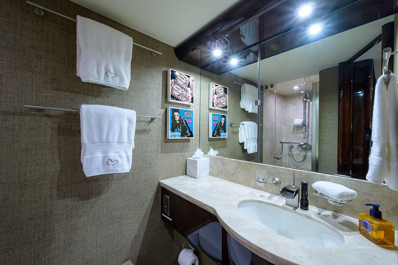 a bathroom with a large mirror aboard THE JOB FATHER Yacht for Sale