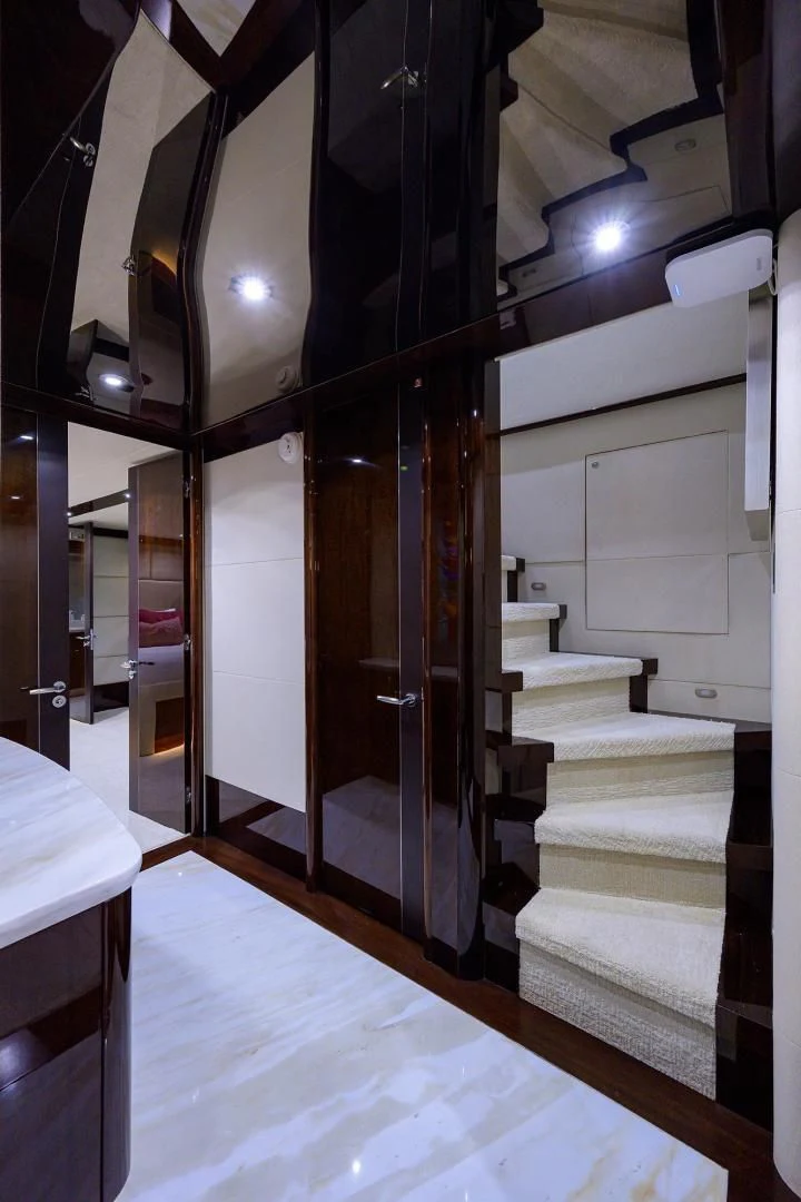 a room with a large mirror aboard THE JOB FATHER Yacht for Sale