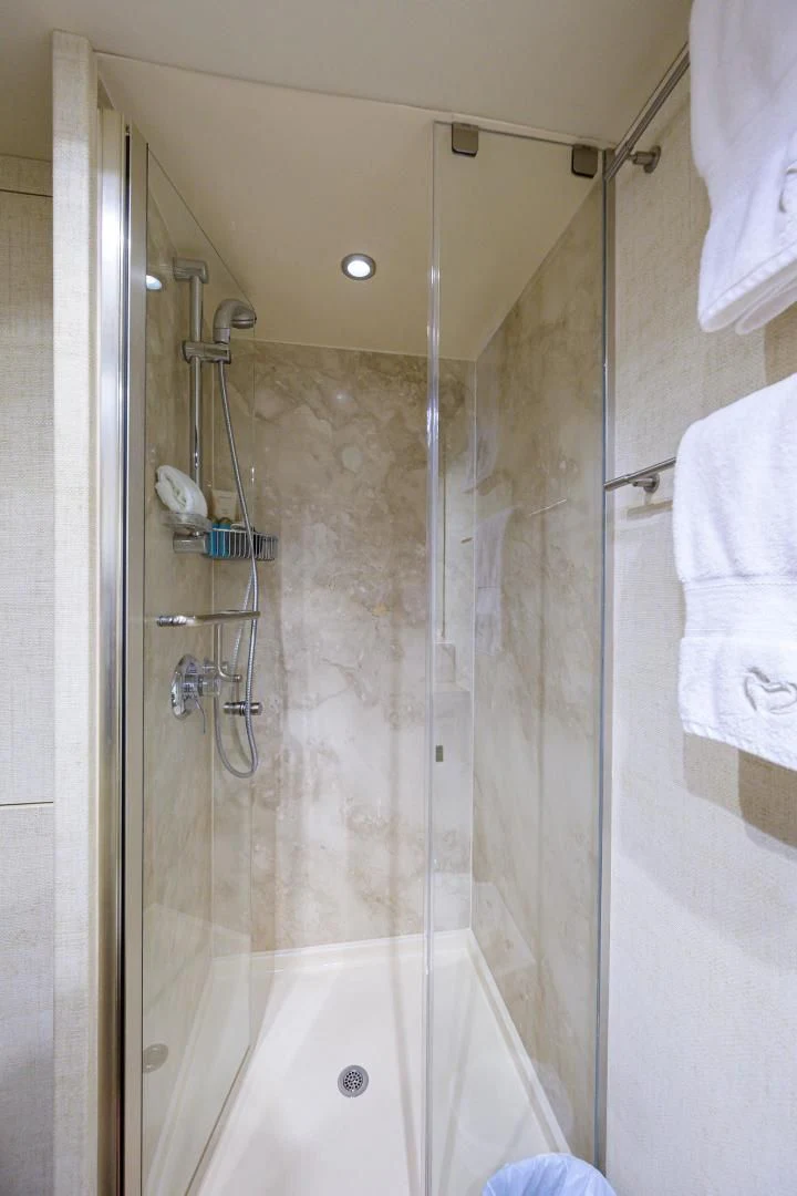 a bathroom with a shower aboard THE JOB FATHER Yacht for Sale