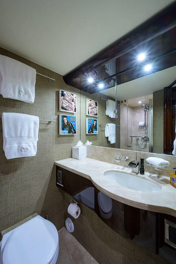 a bathroom with a sink and a toilet aboard THE JOB FATHER Yacht for Sale