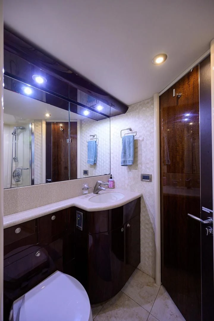 a bathroom with a sink and a toilet aboard THE JOB FATHER Yacht for Sale
