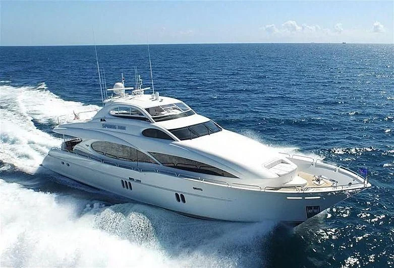 a white yacht on the water aboard THE JOB FATHER Yacht for Sale