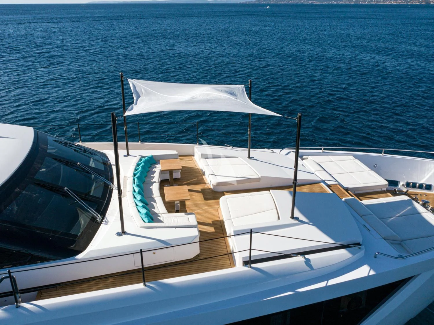 a boat with white umbrellas on it aboard JAG'B Yacht for Sale