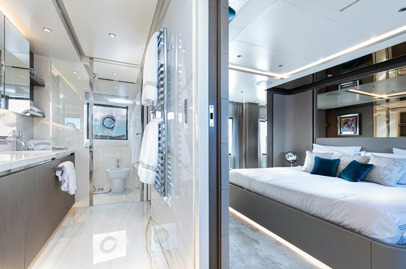 a bathroom with a bed and a sink aboard JAG'B Yacht for Sale