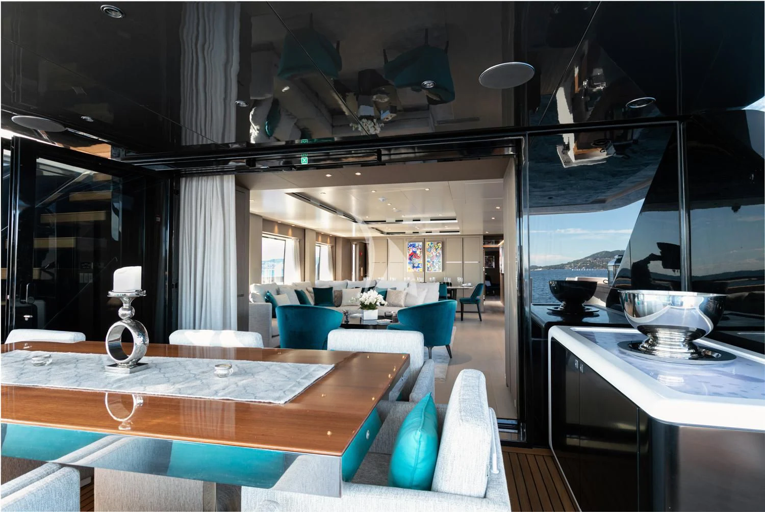 a modern looking kitchen with a large glass window aboard JAG'B Yacht for Sale