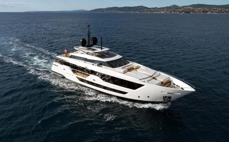 a white boat on the water aboard JAG'B Yacht for Sale