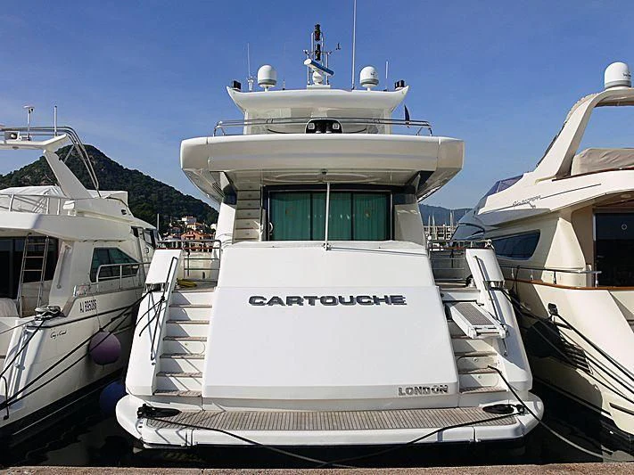 a group of boats in a harbor aboard CARTOUCHE Yacht for Sale
