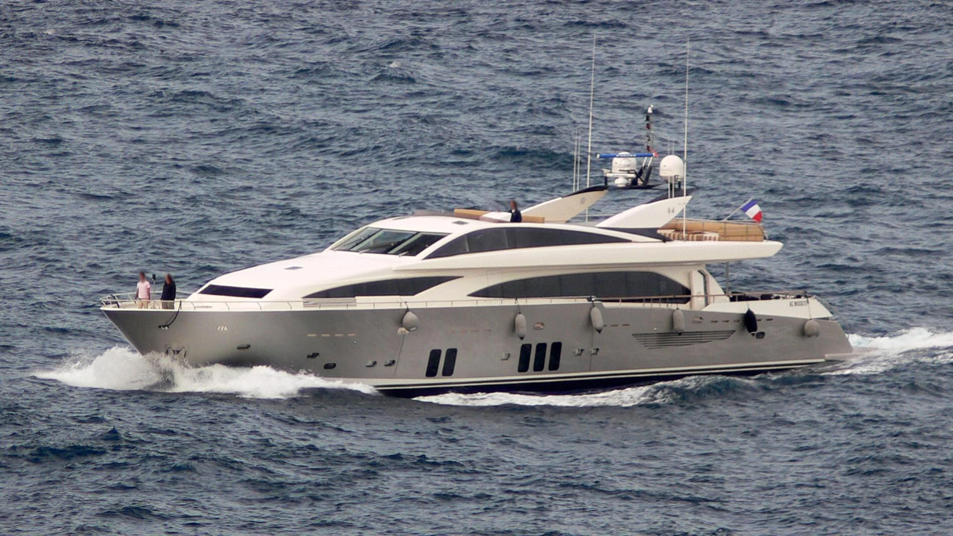 a white yacht in the water aboard DRAGON Yacht for Sale