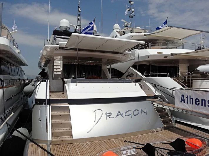 a boat on a dock aboard DRAGON Yacht for Sale
