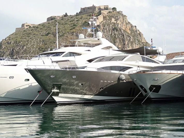 a couple of boats on the water aboard DRAGON Yacht for Sale