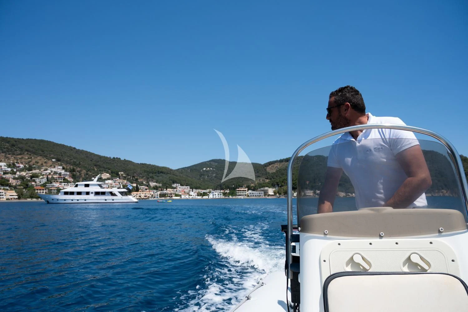 a man on a boat aboard ELENA Yacht for Sale