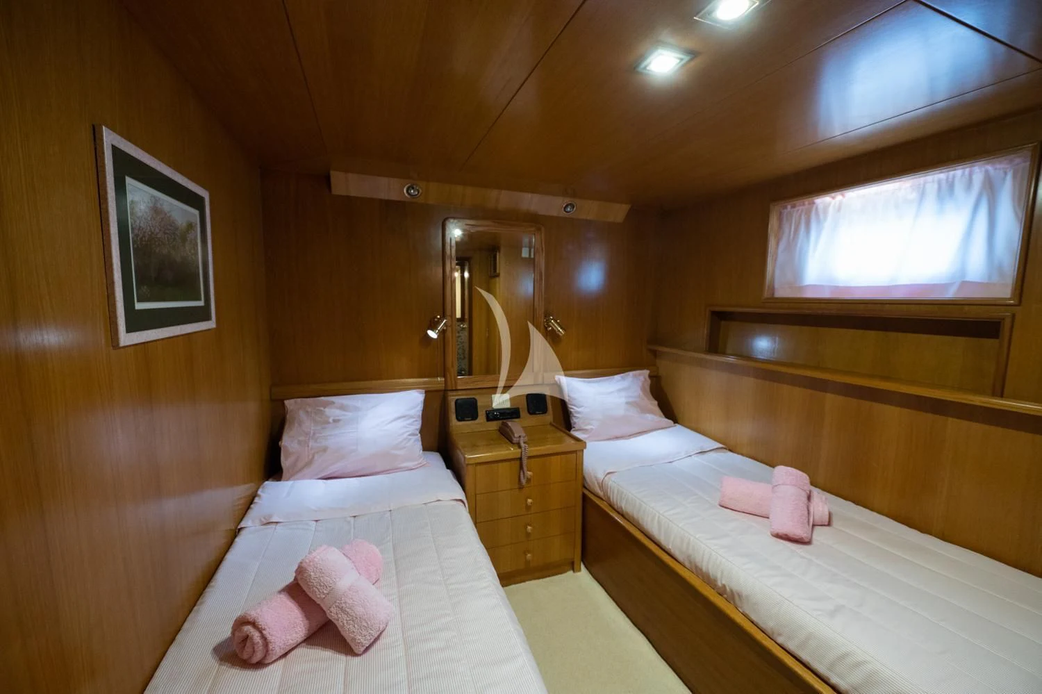 a room with two beds aboard ELENA Yacht for Sale