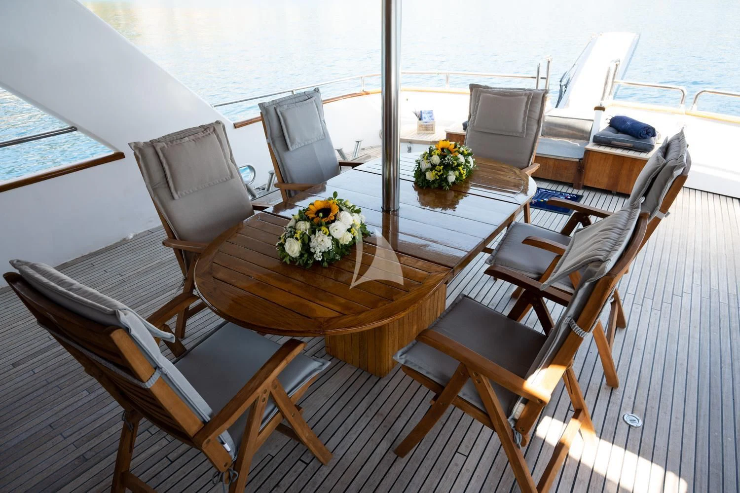 a dining table on a boat aboard ELENA Yacht for Sale
