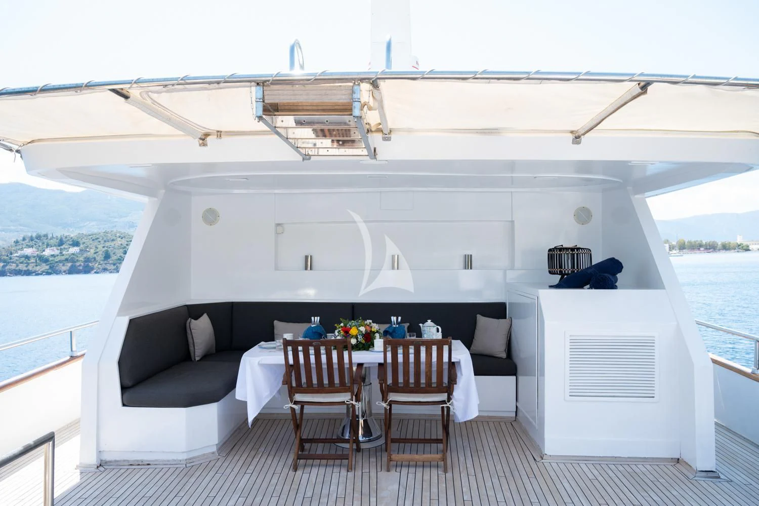 a room with a couch and a table and chairs aboard ELENA Yacht for Sale