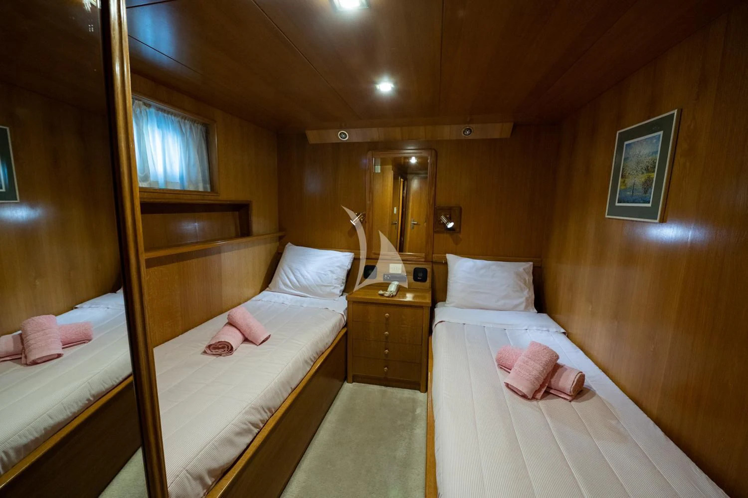 a room with two beds aboard ELENA Yacht for Sale
