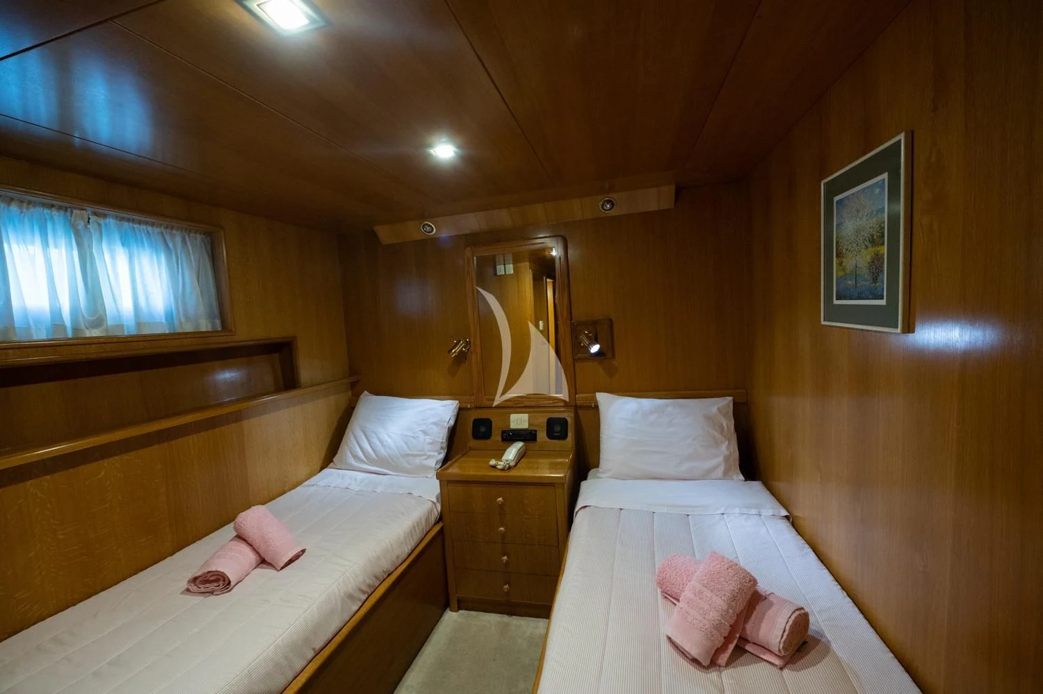 a couple of beds in a hotel room aboard ELENA Yacht for Sale