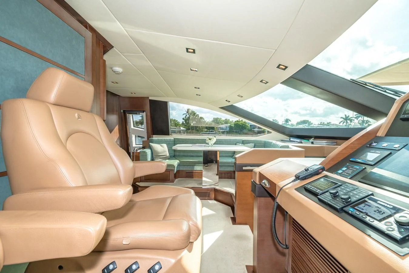 a room with a couch and a piano aboard LIBERTY BLUE Yacht for Sale