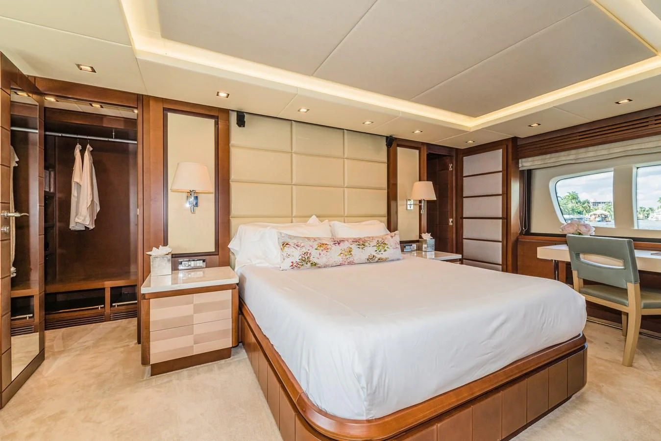 a large bedroom with a large bed aboard LIBERTY BLUE Yacht for Sale