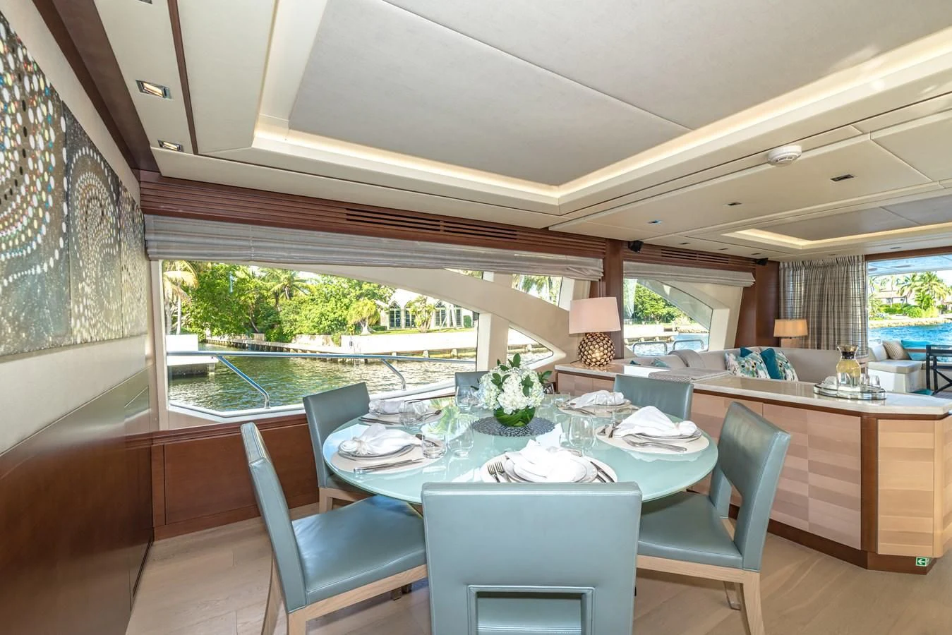 a large dining table in a room aboard LIBERTY BLUE Yacht for Sale