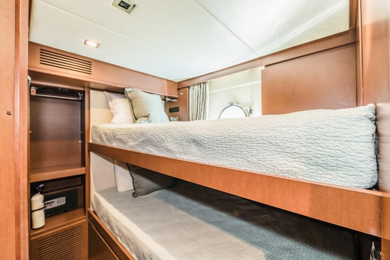 a bed in a room aboard LIBERTY BLUE Yacht for Sale