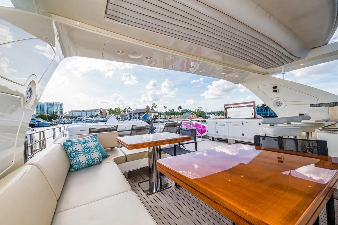 a room with a table and chairs aboard LIBERTY BLUE Yacht for Sale