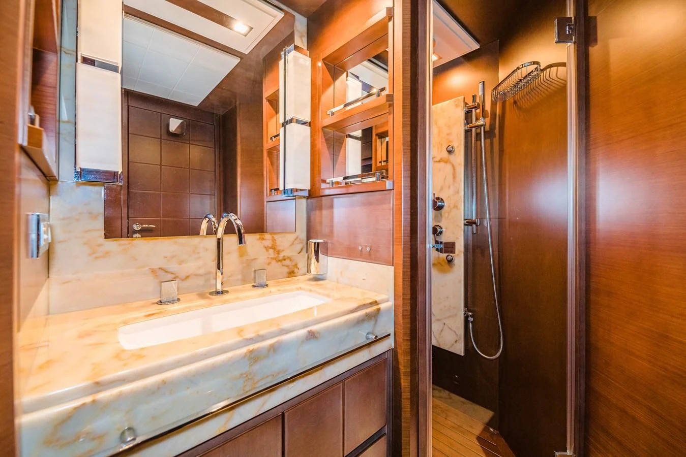a bathroom with a sink and a shower aboard LIBERTY BLUE Yacht for Sale
