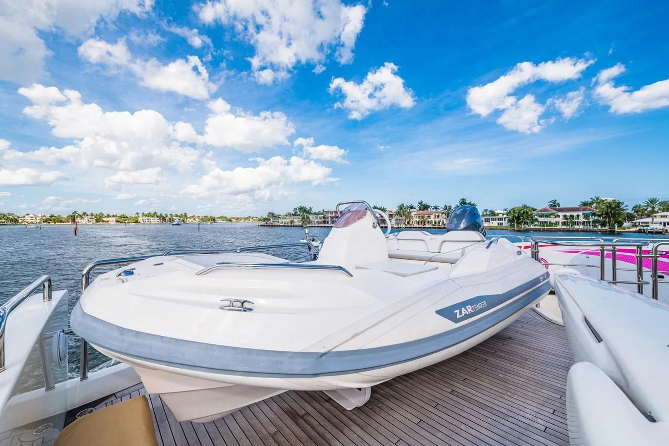 a boat on a dock aboard LIBERTY BLUE Yacht for Sale