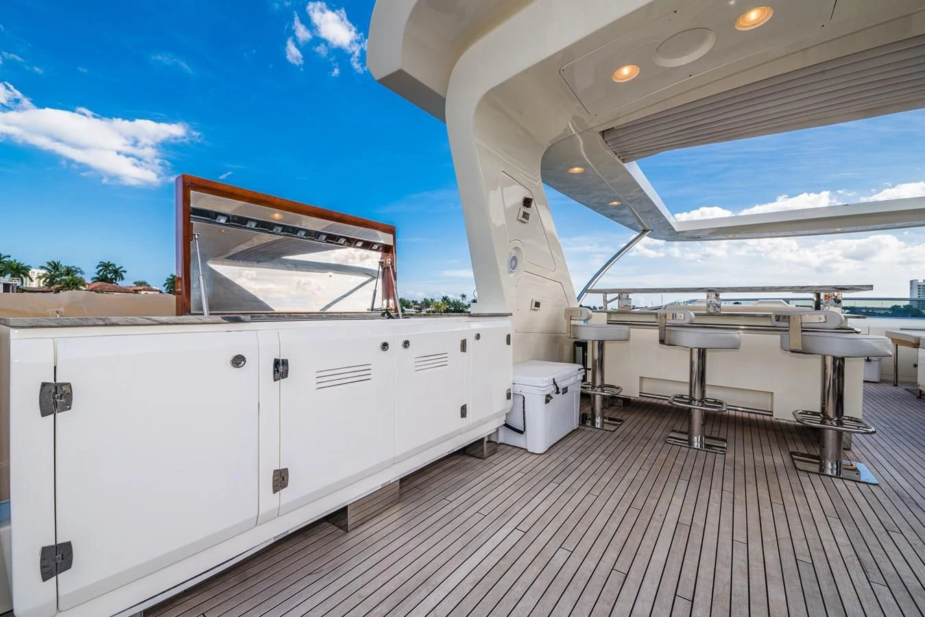 a room with tables and chairs aboard LIBERTY BLUE Yacht for Sale