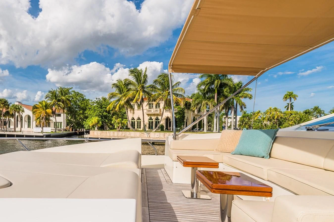 a patio with a table and chairs aboard LIBERTY BLUE Yacht for Sale