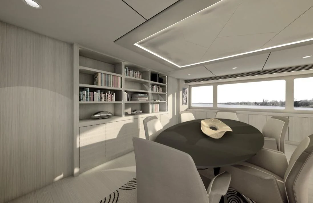 a room with a table and chairs aboard UNEXPECTED Yacht for Sale