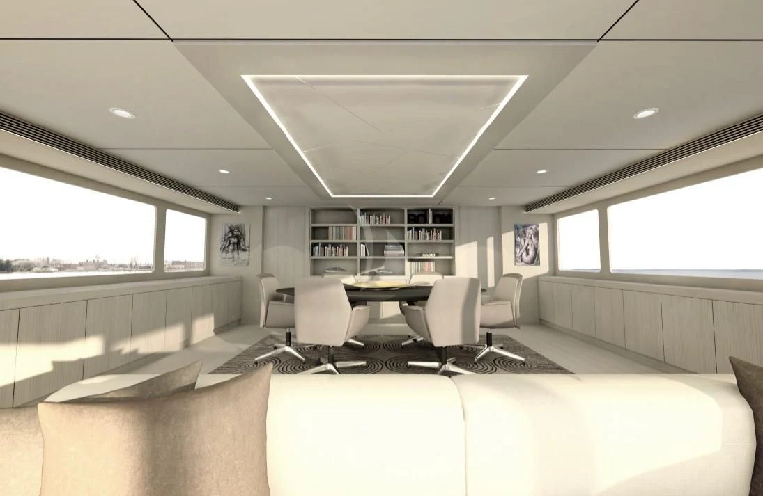 a room with a couch and a table and chairs aboard UNEXPECTED Yacht for Sale