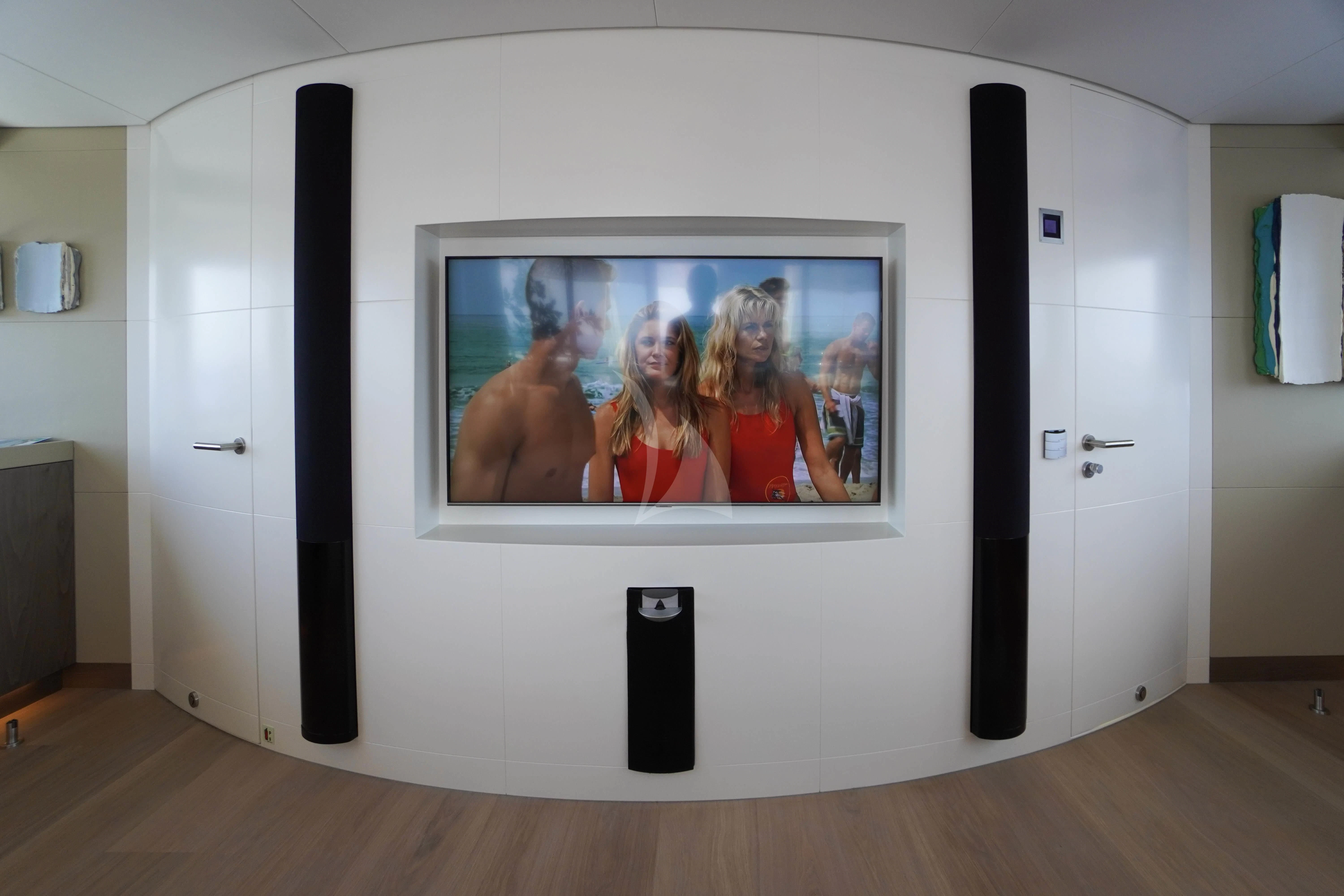 a white wall with a picture on it aboard UNEXPECTED Yacht for Sale