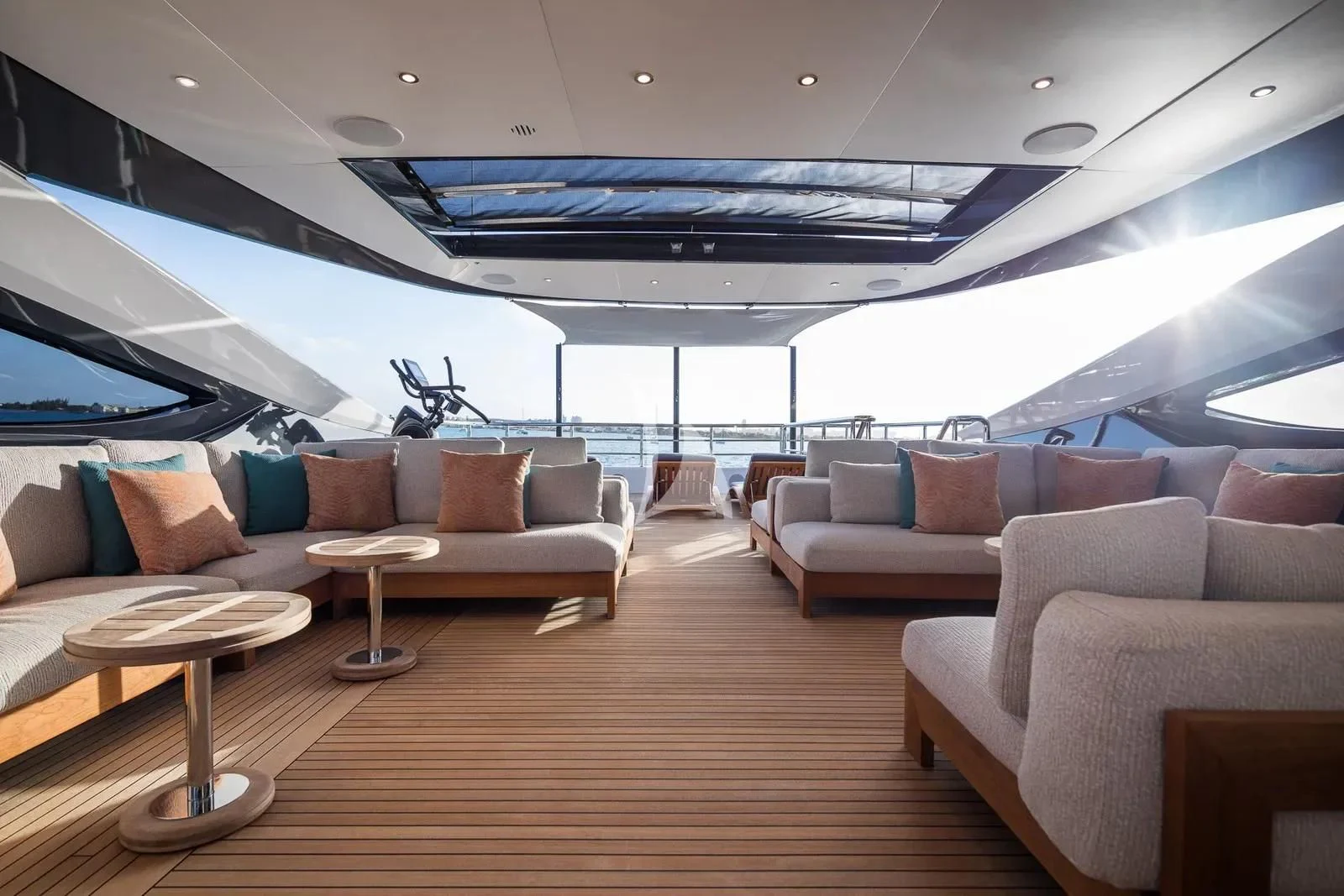 a room with couches and a table aboard BIRUBI Yacht for Sale