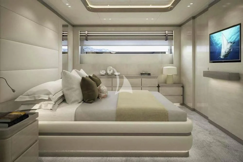 a white bed in a room aboard BIRUBI Yacht for Sale