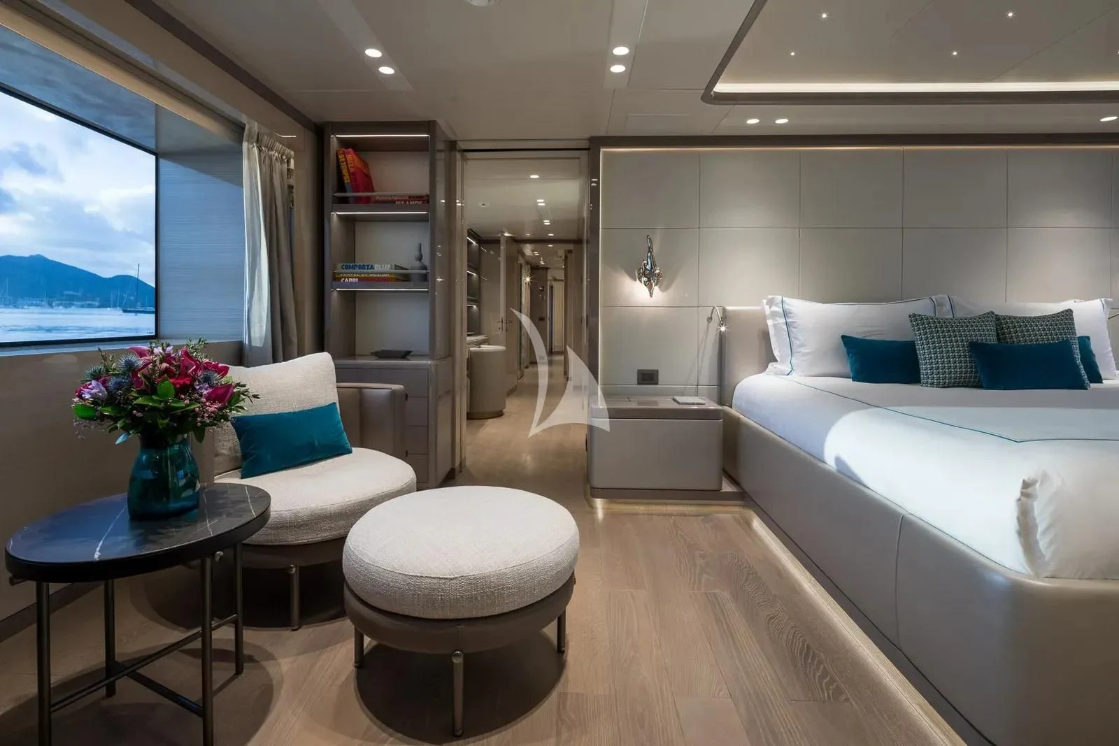 a room with a bed and a table aboard BIRUBI Yacht for Sale