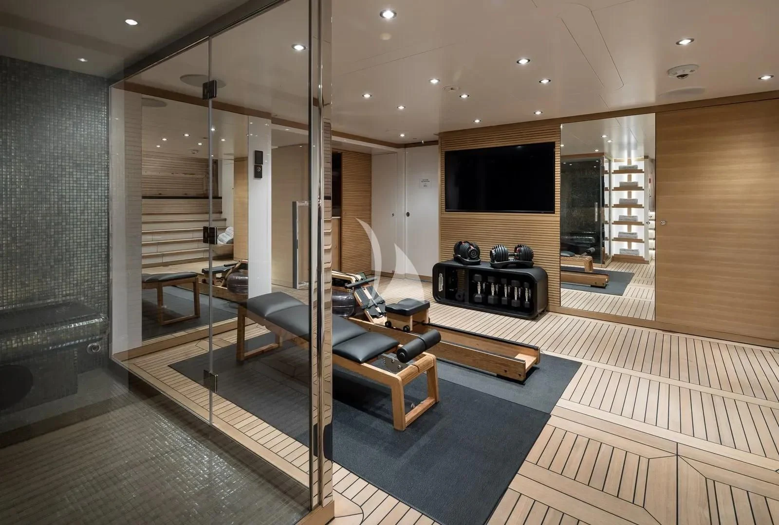 a large room with a large glass wall and a large mirror aboard BIRUBI Yacht for Sale