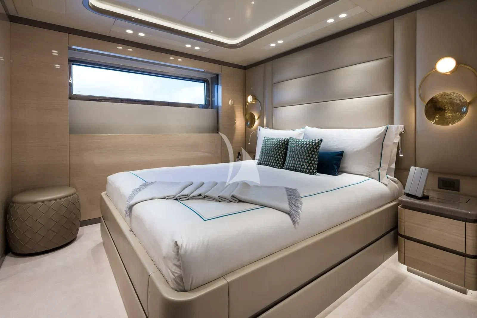 a room with a bed and a mirror aboard BIRUBI Yacht for Sale
