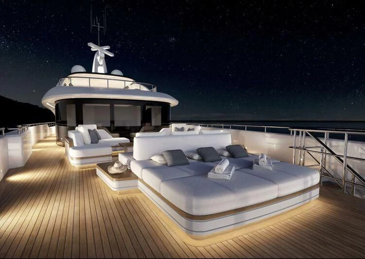 a large white boat on a deck aboard BIRUBI Yacht for Sale