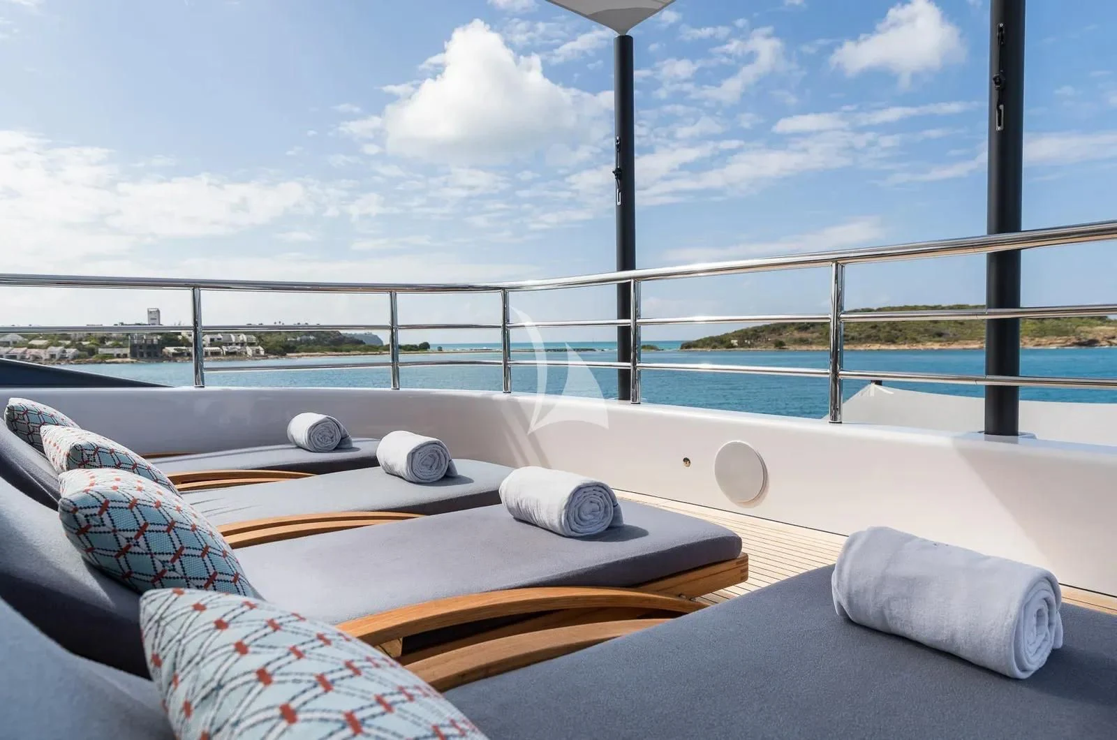 a bed on a balcony aboard BIRUBI Yacht for Sale
