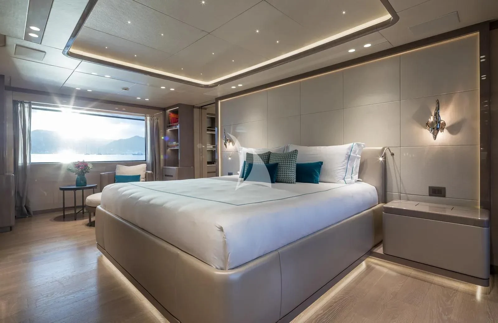 a large bedroom with a large bed aboard BIRUBI Yacht for Sale