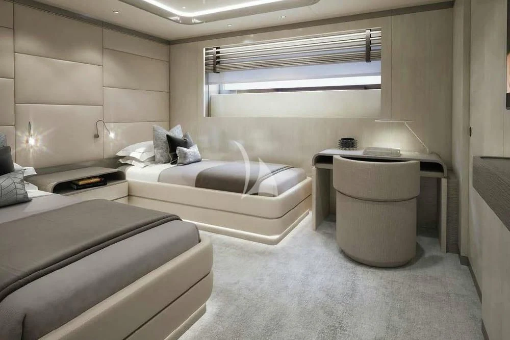 a small room with a bed and a couch aboard BIRUBI Yacht for Sale