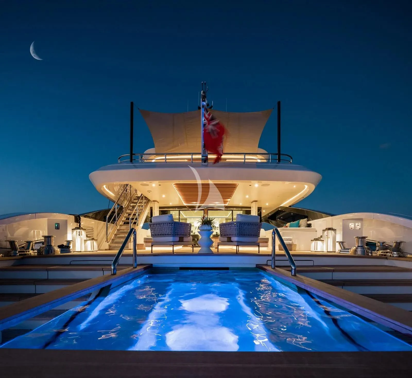 a large cruise ship docked aboard BIRUBI Yacht for Sale