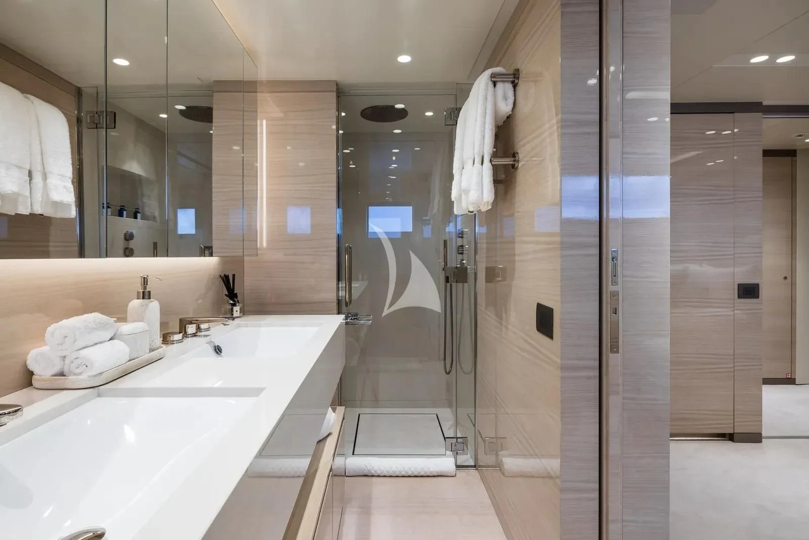 a bathroom with a large mirror aboard BIRUBI Yacht for Sale