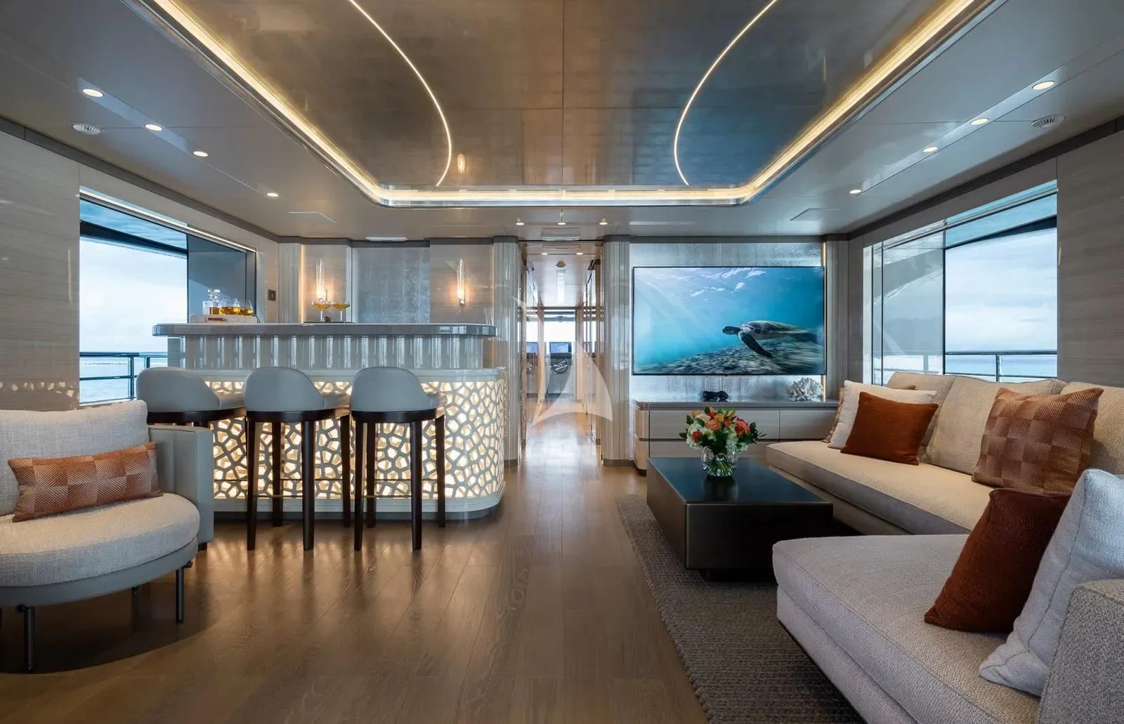 a large living room with a large window aboard BIRUBI Yacht for Sale