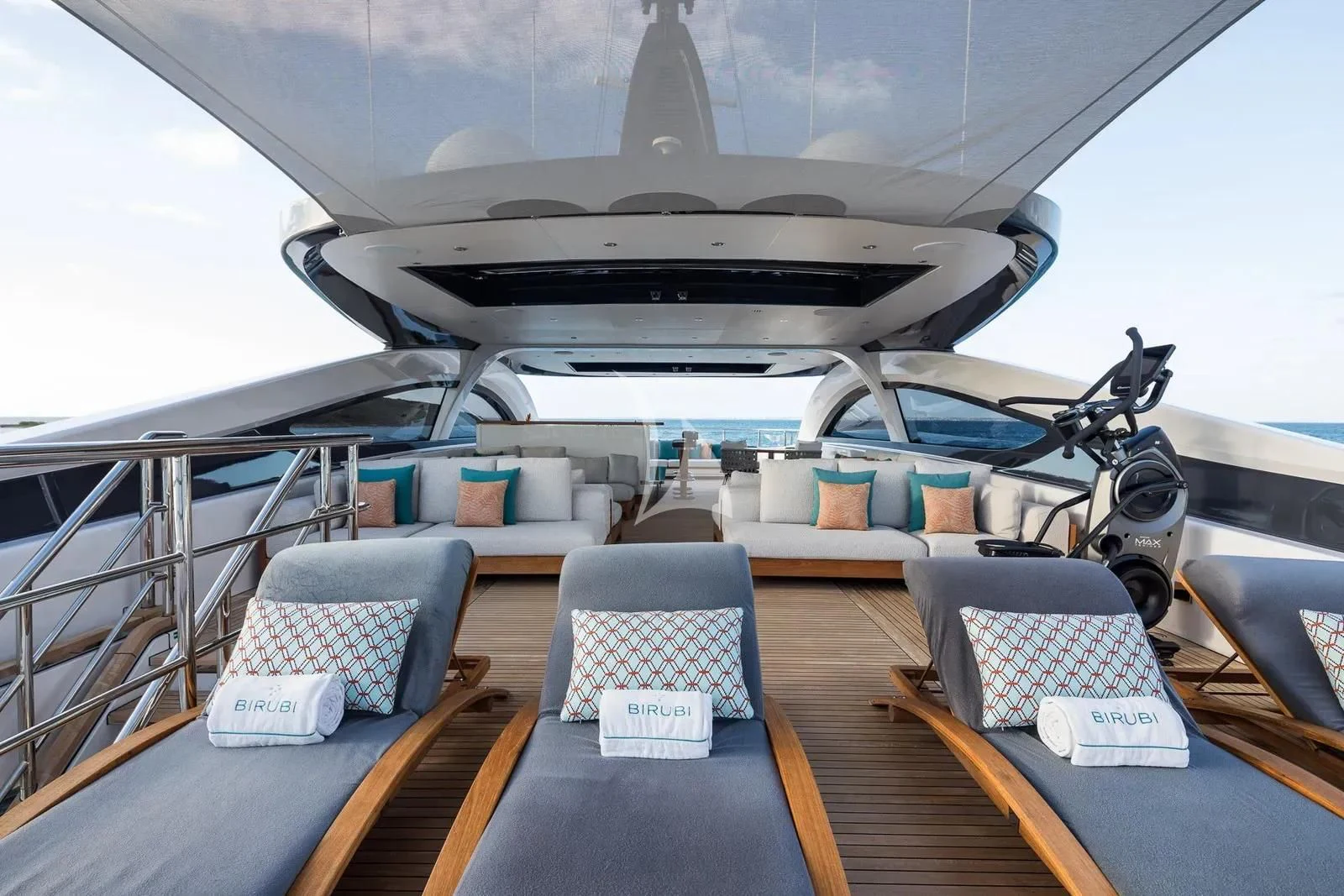 a large room with a couch and a large telescope aboard BIRUBI Yacht for Sale