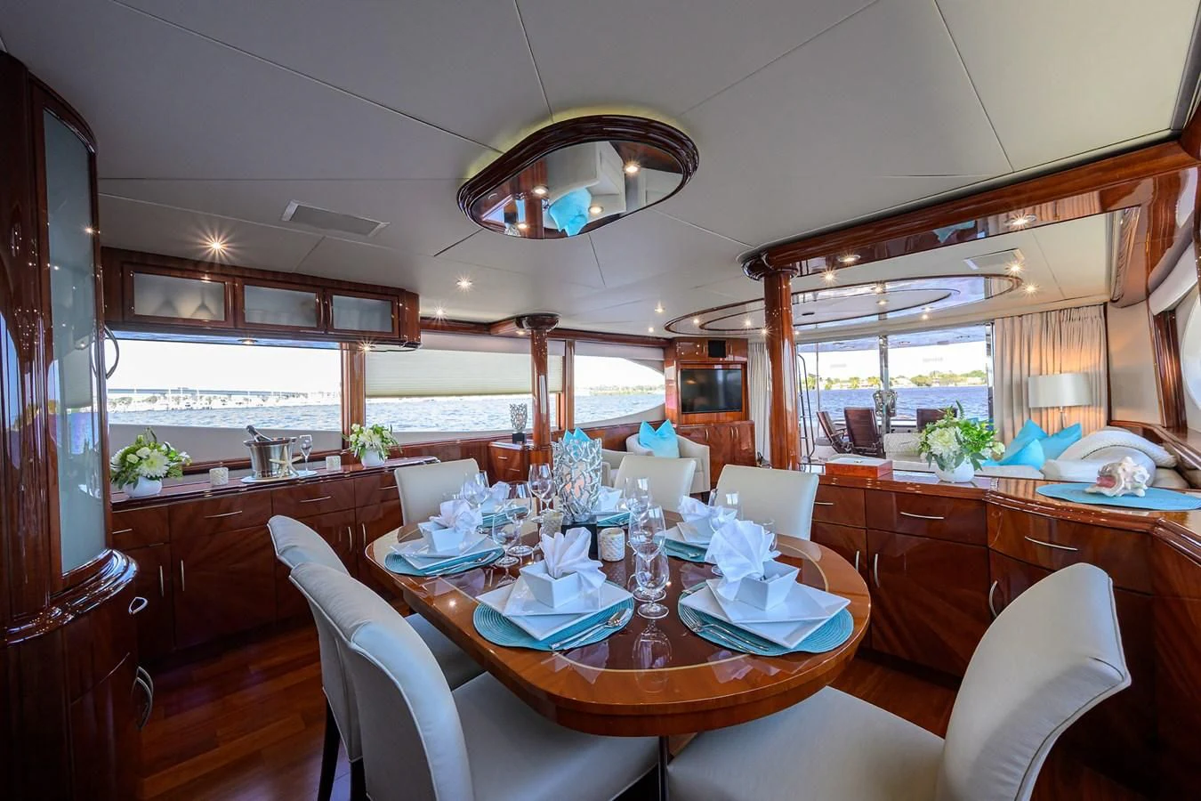 a dining room with a table and chairs aboard ALWAYS BAREFOOT Yacht for Sale