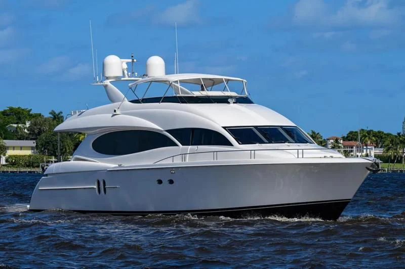 a white yacht on water aboard ALWAYS BAREFOOT Yacht for Sale