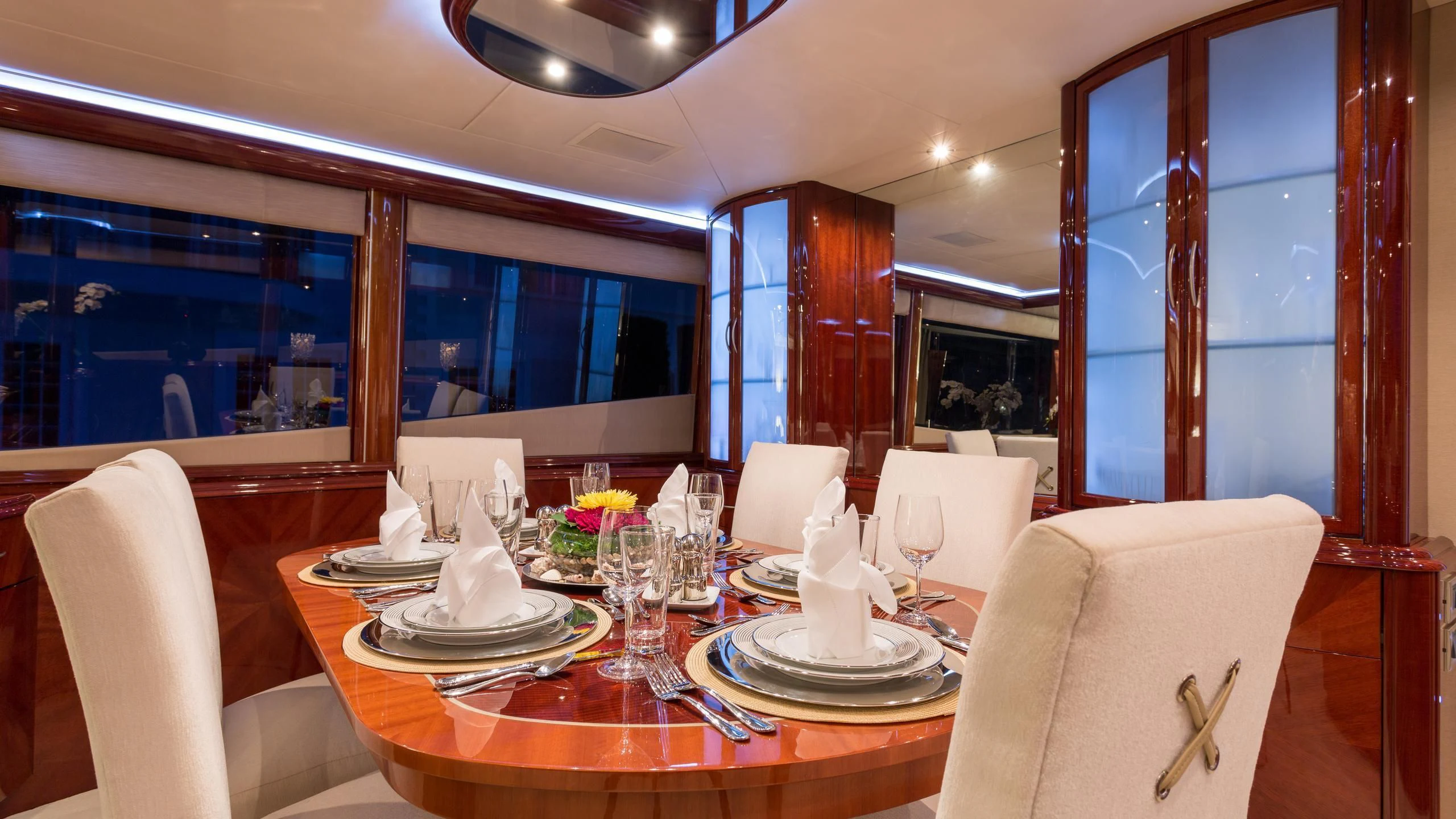 a dining room with a table set aboard ALWAYS BAREFOOT Yacht for Sale