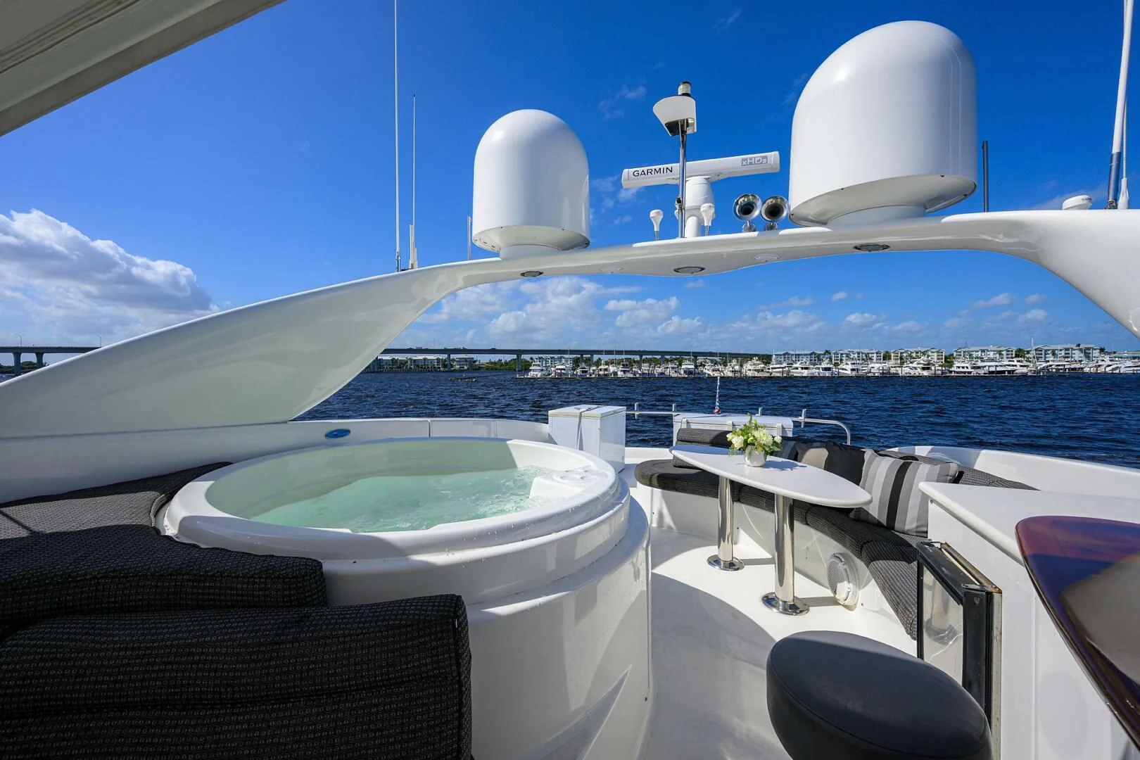 a large white ship with a large white building in the background aboard ALWAYS BAREFOOT Yacht for Sale